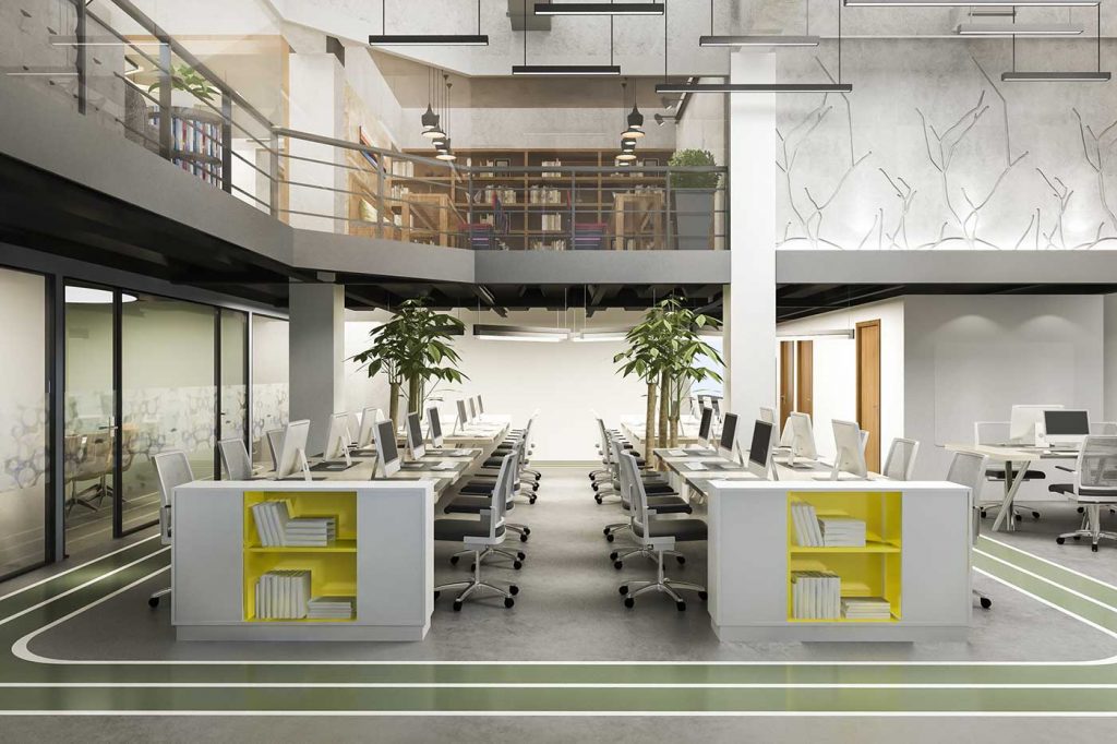 open space ufficio con scrivanie, sedie e piante